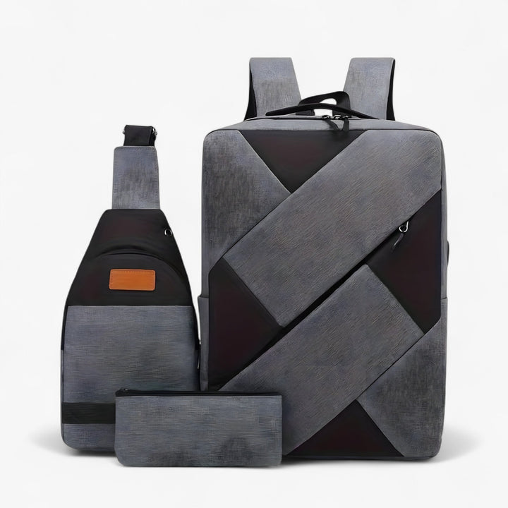 Pochette grigia compatta, perfetta per accessori donna e cosmetici, inclusa nel set zaino donna 3-in-1.