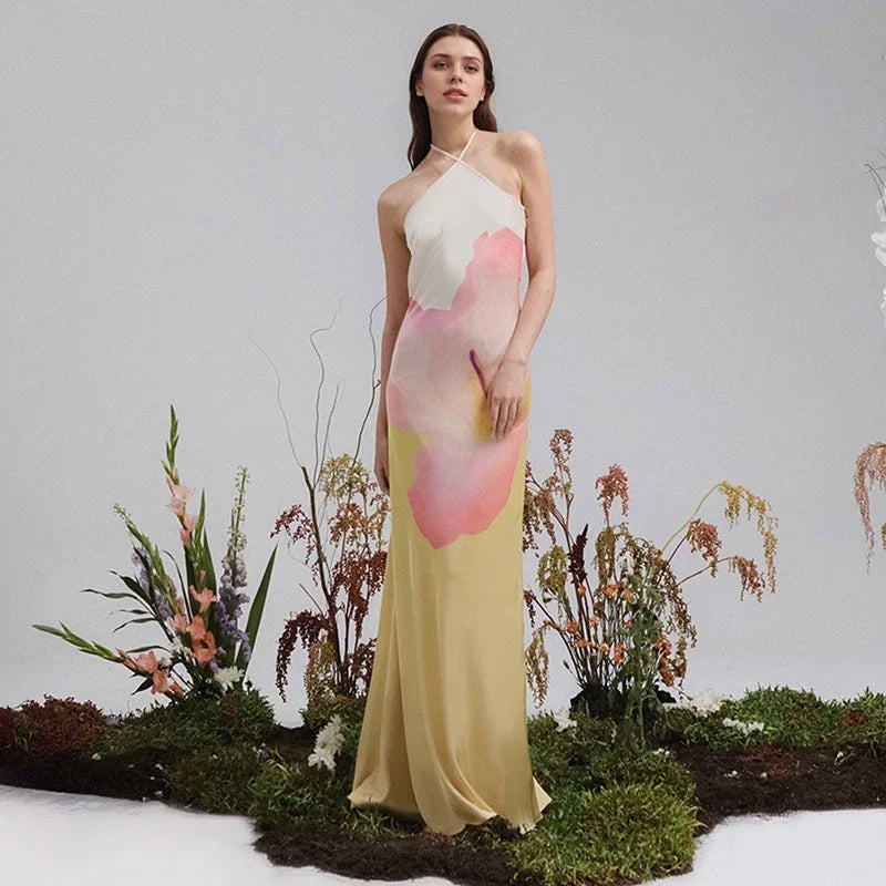 Vestito lungo da donna con stampa vivace, monospalla, perfetto per feste e serate estive.