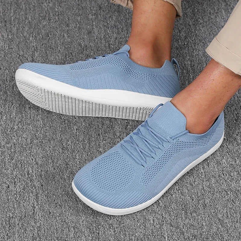 Sneakers uomo traspiranti e leggere, perfette per comfort quotidiano e camminata. Suola ammortizzata.