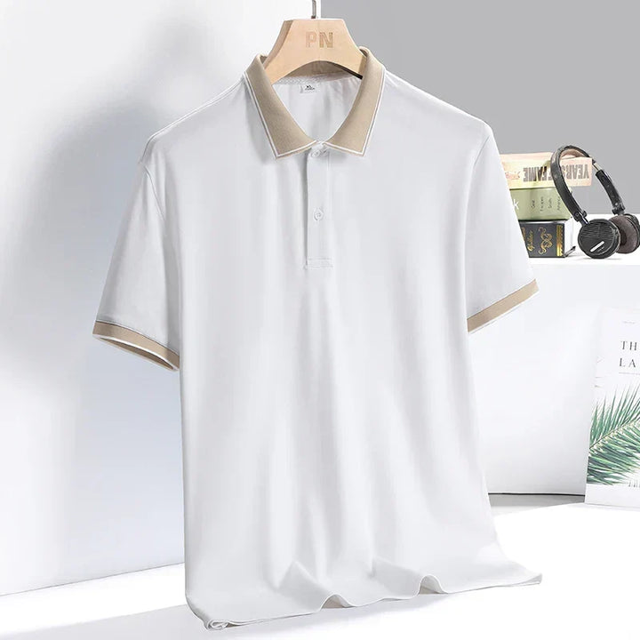 Polo casual uomo con profili a contrasto sul colletto e polsini. Un must-have per l'abbigliamento estivo.
