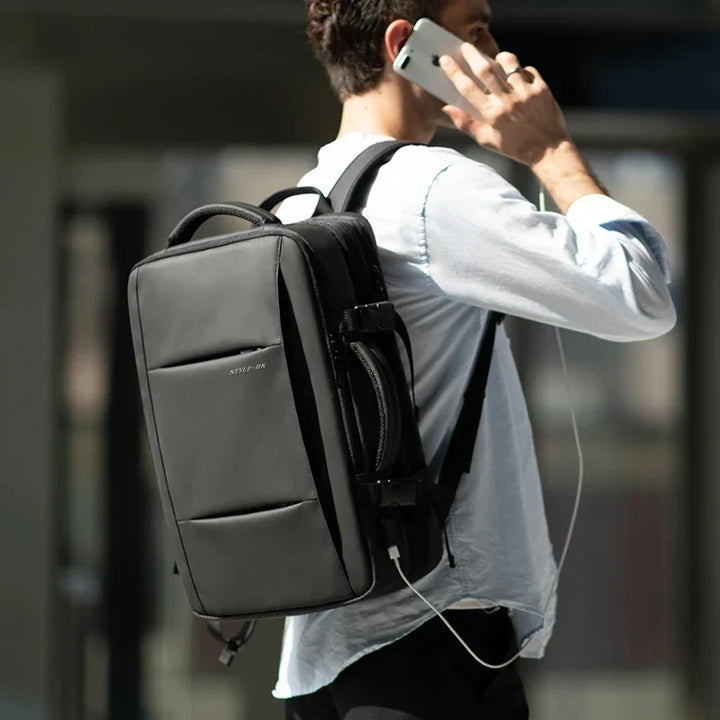 Zaino business uomo con porta USB di ricarica, scomparto PC 15.6", ideale per lavoro, scuola e università.