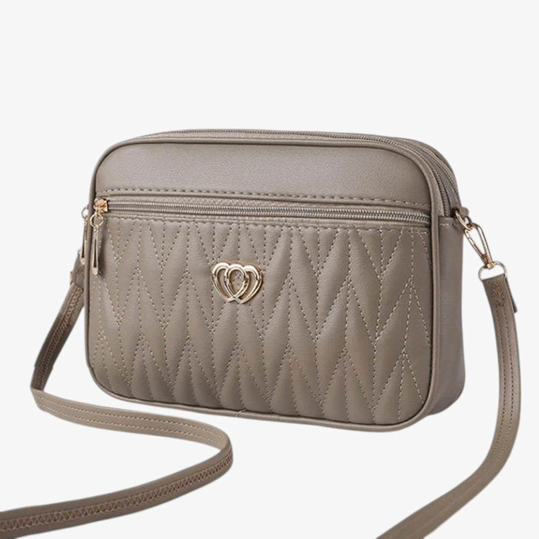 Borsa donna multicolore trapuntata, tracolla regolabile, perfetta per un tocco di colore.