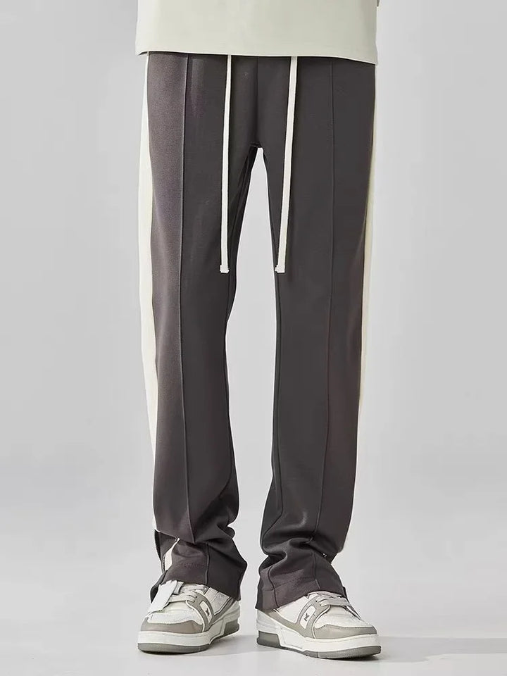 Pantaloni uomo streetwear a gamba dritta, con banda laterale e vita elasticizzata per comfort moderno.