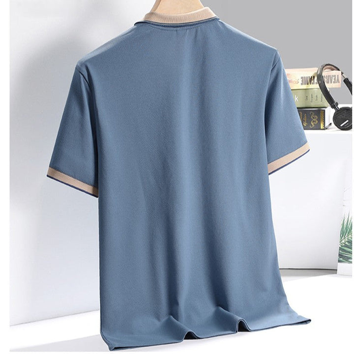 Polo da uomo in cotone con profili a contrasto, taglio sartoriale per un comfort e stile impeccabili.