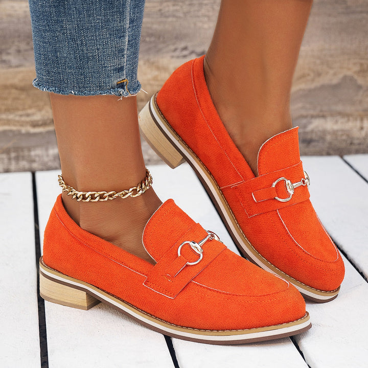 Mocassini donna eleganti con zeppa e supporto plantare, per comfort duraturo. Ideali per look casual o chic.