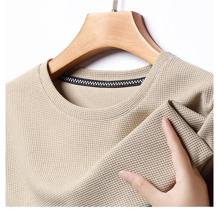 Maglietta uomo traspirante con tecnologia a nido d'ape per comfort ottimale. Girocollo, manica corta casual.