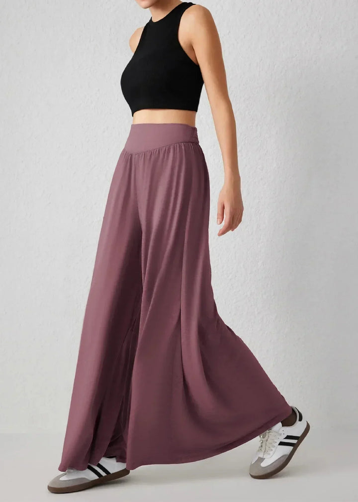 Pantaloni estivi donna a vita elasticizzata, gamba larga, perfetti per vacanza e relax.