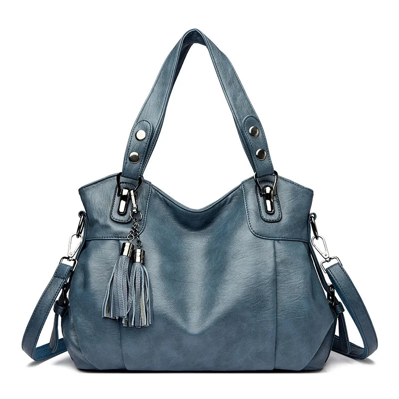 Borsa a spalla da donna nera, elegante e versatile tote bag con tracolla regolabile.