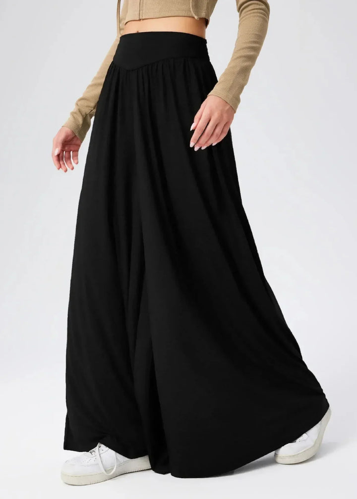 Pantaloni casual donna, vita elasticizzata, gamba larga. Perfetti per un'estate all'insegna del comfort.