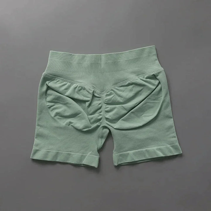 Short seamless donna verde militare, vita alta, per yoga, fitness e tempo libero.