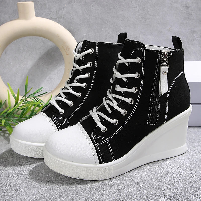 Scarpe sneakers donna con zeppa, chiusura zip e lacci frontali, per un fit regolabile e sicuro.