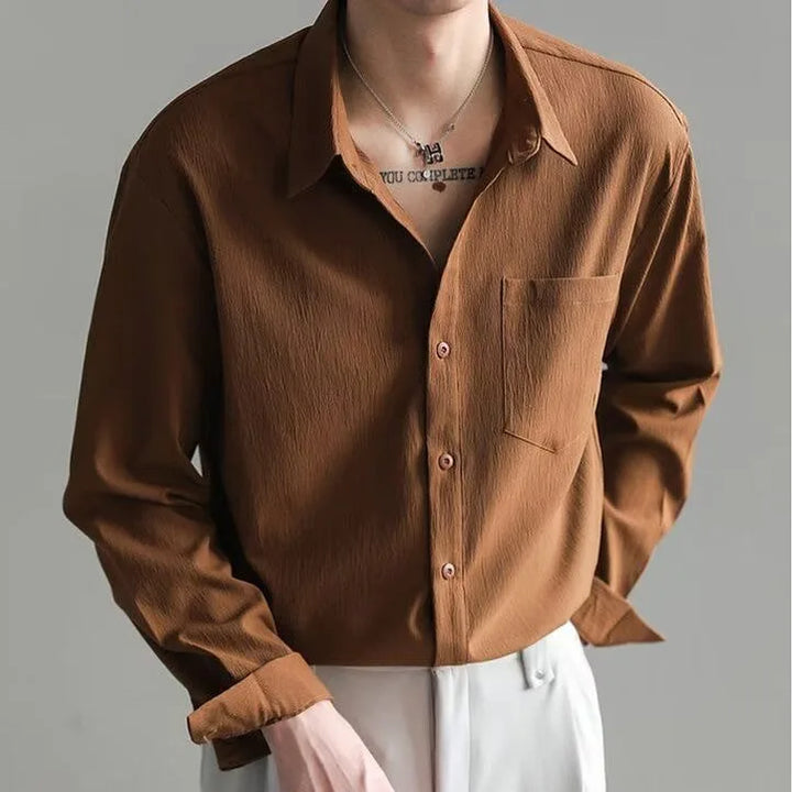 Camicia uomo elegante antipiega a tinta unita, ideale per ufficio e business casual, maniche lunghe.