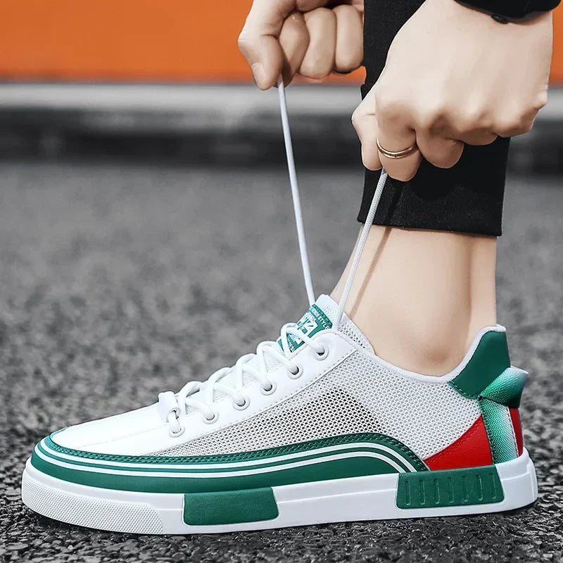 Scarpe da ginnastica uomo casual, disponibili in bianco e nero, con chiusura sicura per sport e tempo libero.