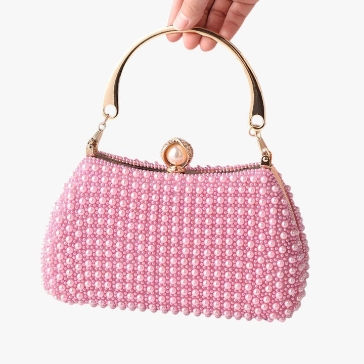 Accessorio da sera donna: borsa elegante con perline multicolore e chiusura raffinata, per un tocco di classe.
