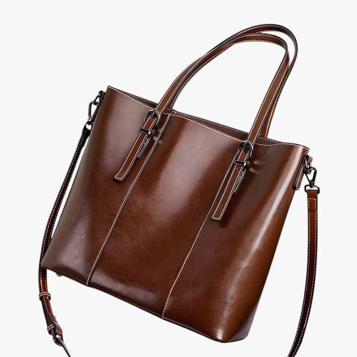 Retro borsa tote donna marrone scuro, design pulito. Accessorio moda capiente per viaggi e quotidiano.