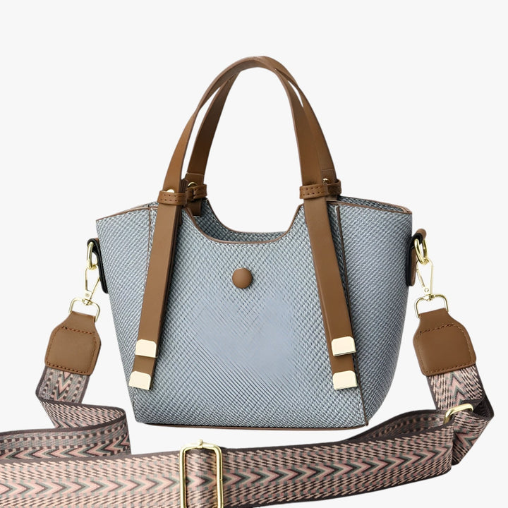 Borsa tote compatta donna, portabile a mano o tracolla, accessorio moda quotidiano e versatile.