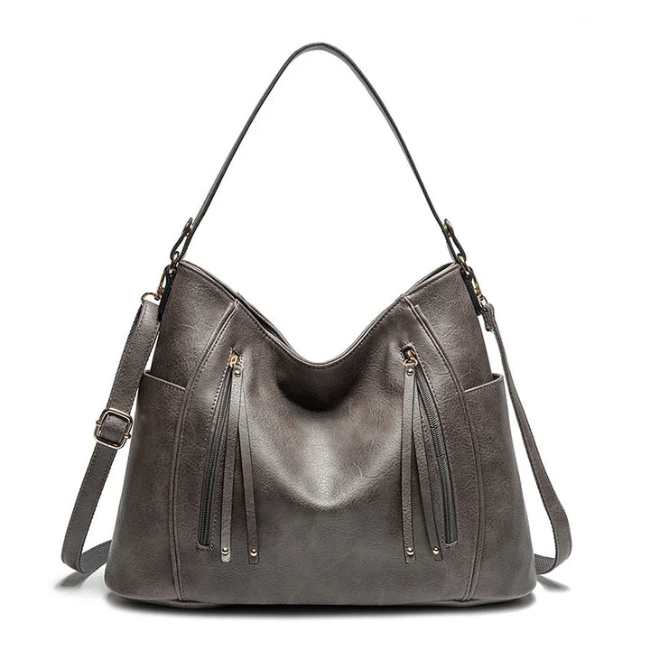Borsa a mano donna effetto pelle, stile classico. Un tocco di lusso per la donna moderna.
