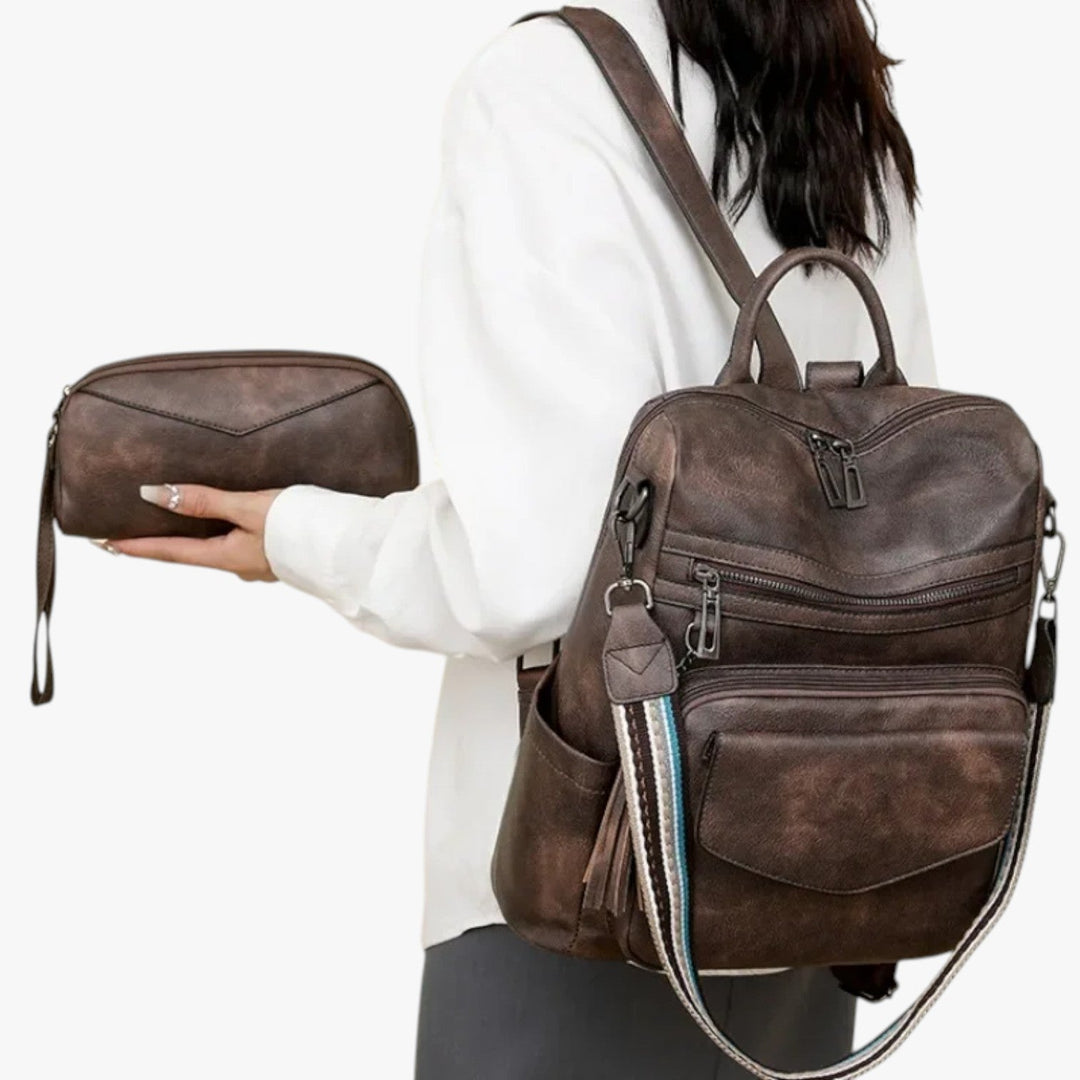 Zaino donna laterale, evidenzia profondità e capacità di carico, con fantasie multicolori vivaci.