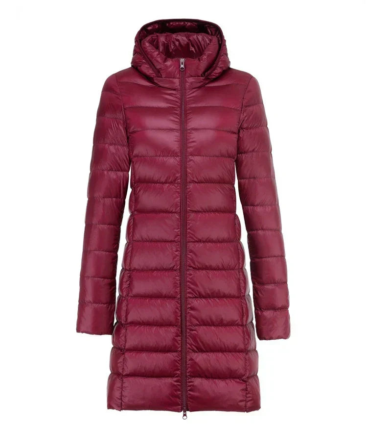 Giacca lunga invernale da donna ultraleggera e versatile, perfetta per il freddo. Stile slim fit.