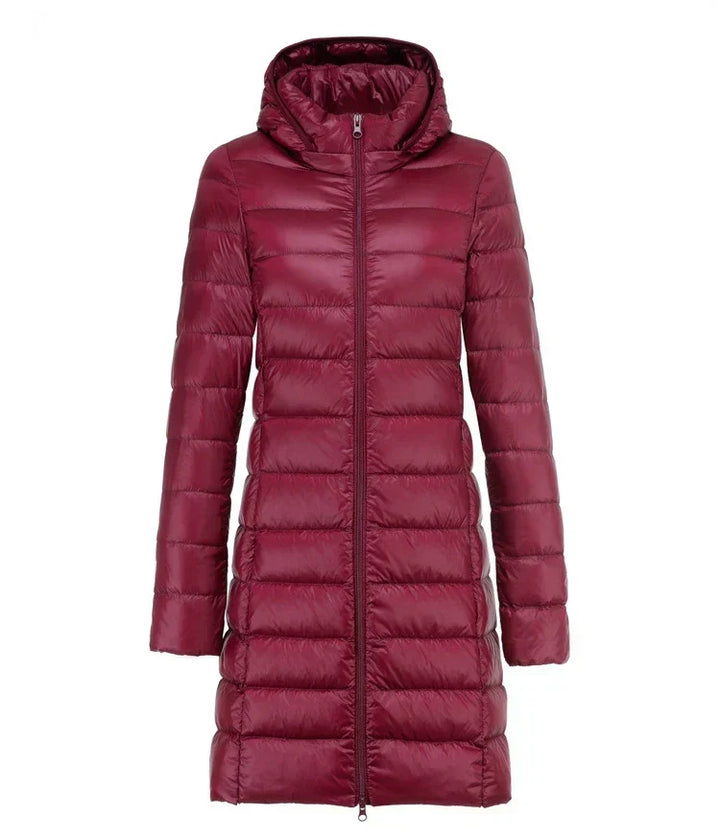 Giacca lunga invernale da donna ultraleggera e versatile, perfetta per il freddo. Stile slim fit.