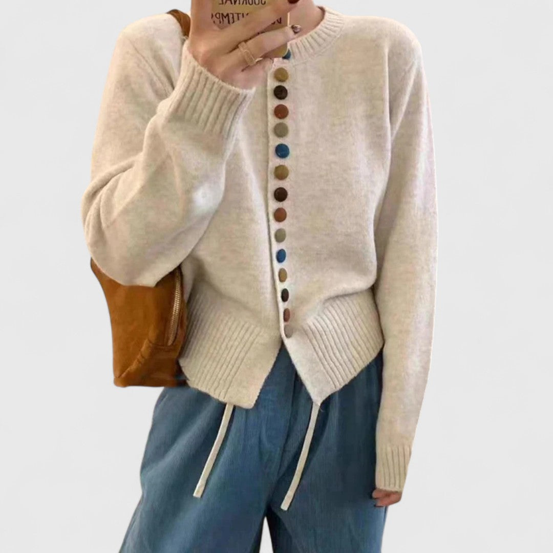 Cardigan donna elegante a maglia, perfetto per look raffinati. Capo versatile per ufficio o sera.