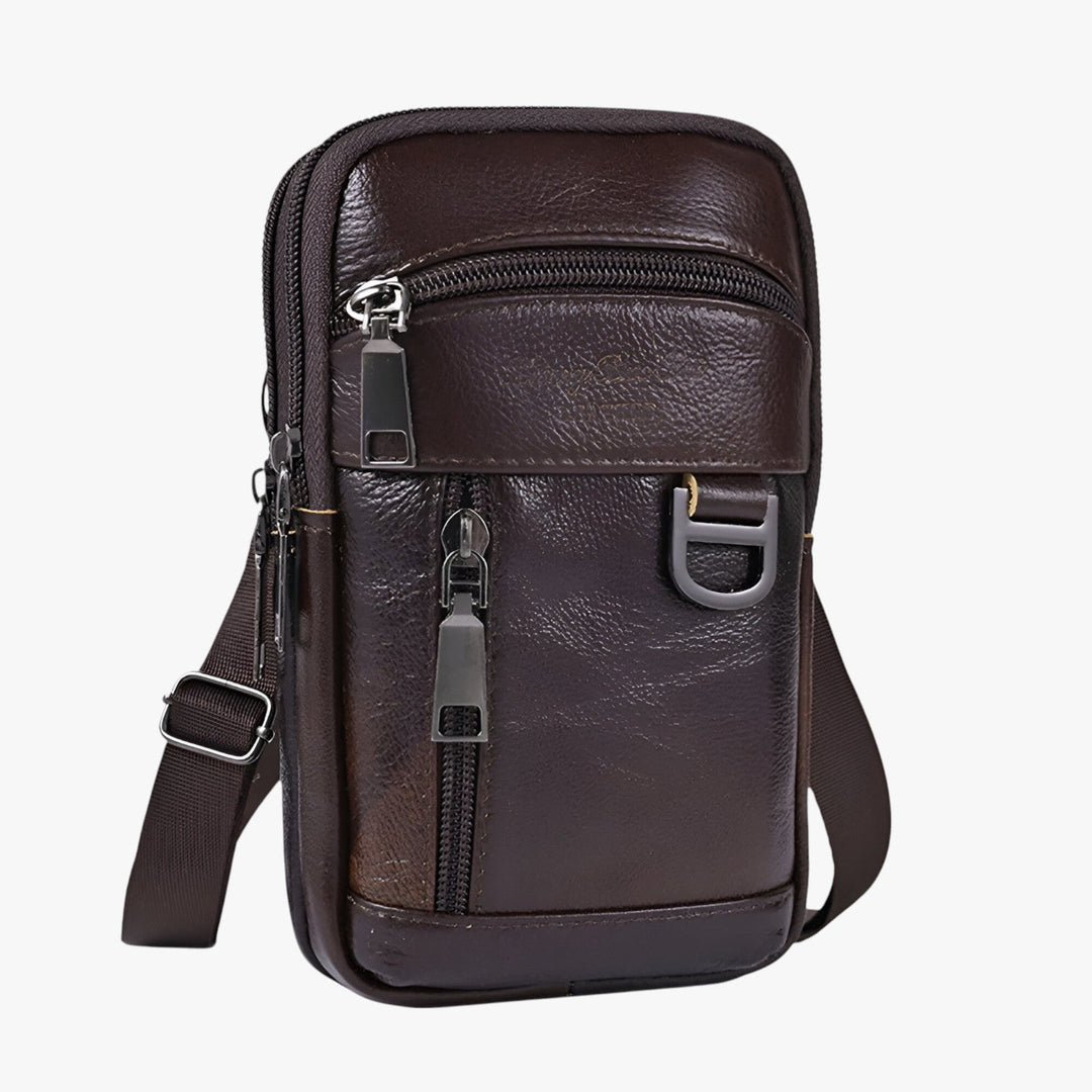 Dettaglio della borsa a tracolla da uomo marrone, perfetta per organizzare i tuoi essenziali.
