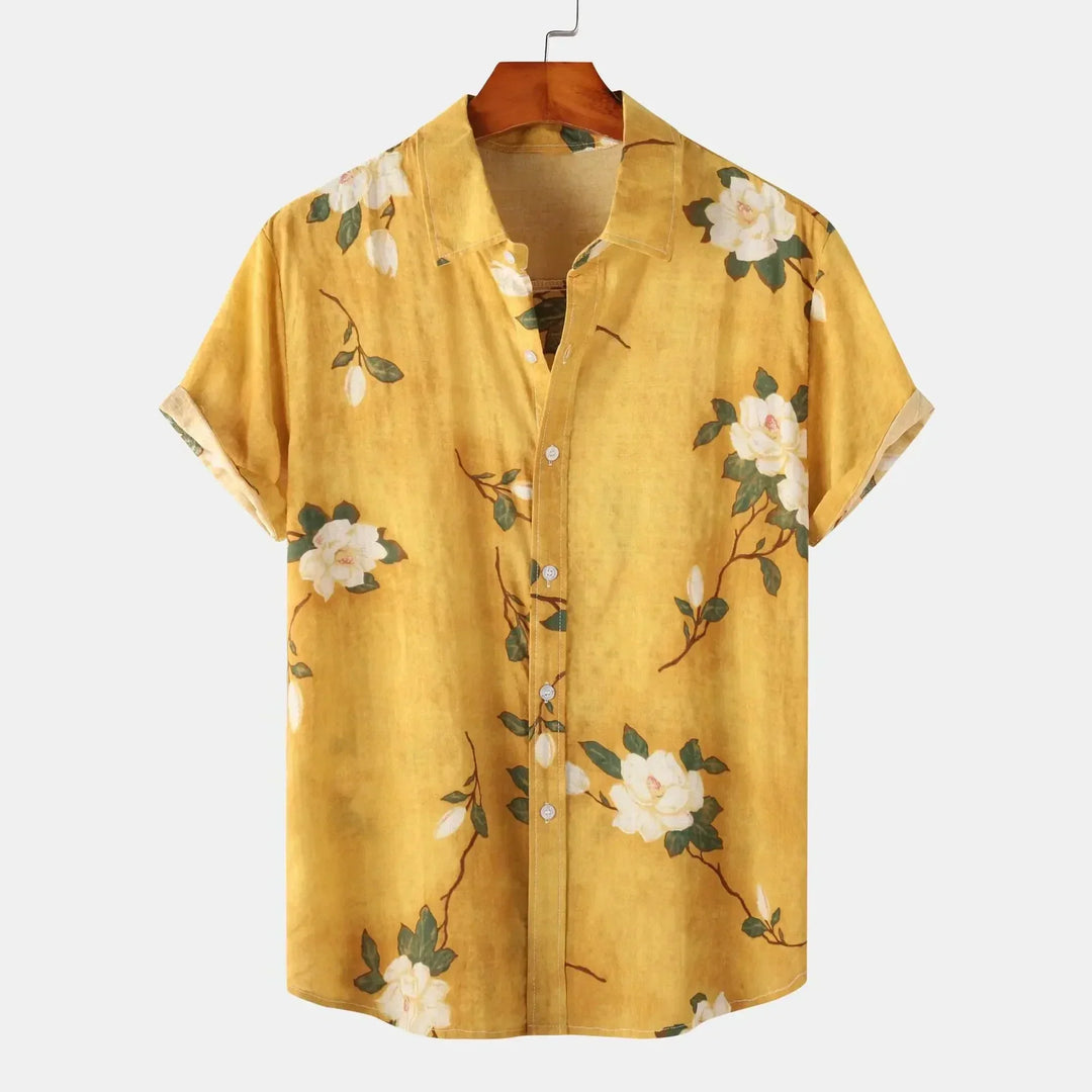 Camicia uomo a maniche corte, stampa floreale marrone e bottoni. Abbigliamento estivo con vestibilità sartoriale.