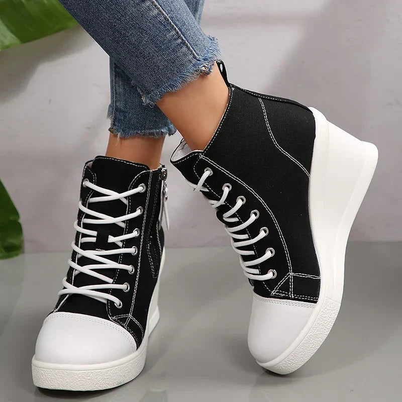 Versatili sneakers donna con zeppa, zip e lacci frontali. Scarpe casual ed eleganti per ogni occasione.