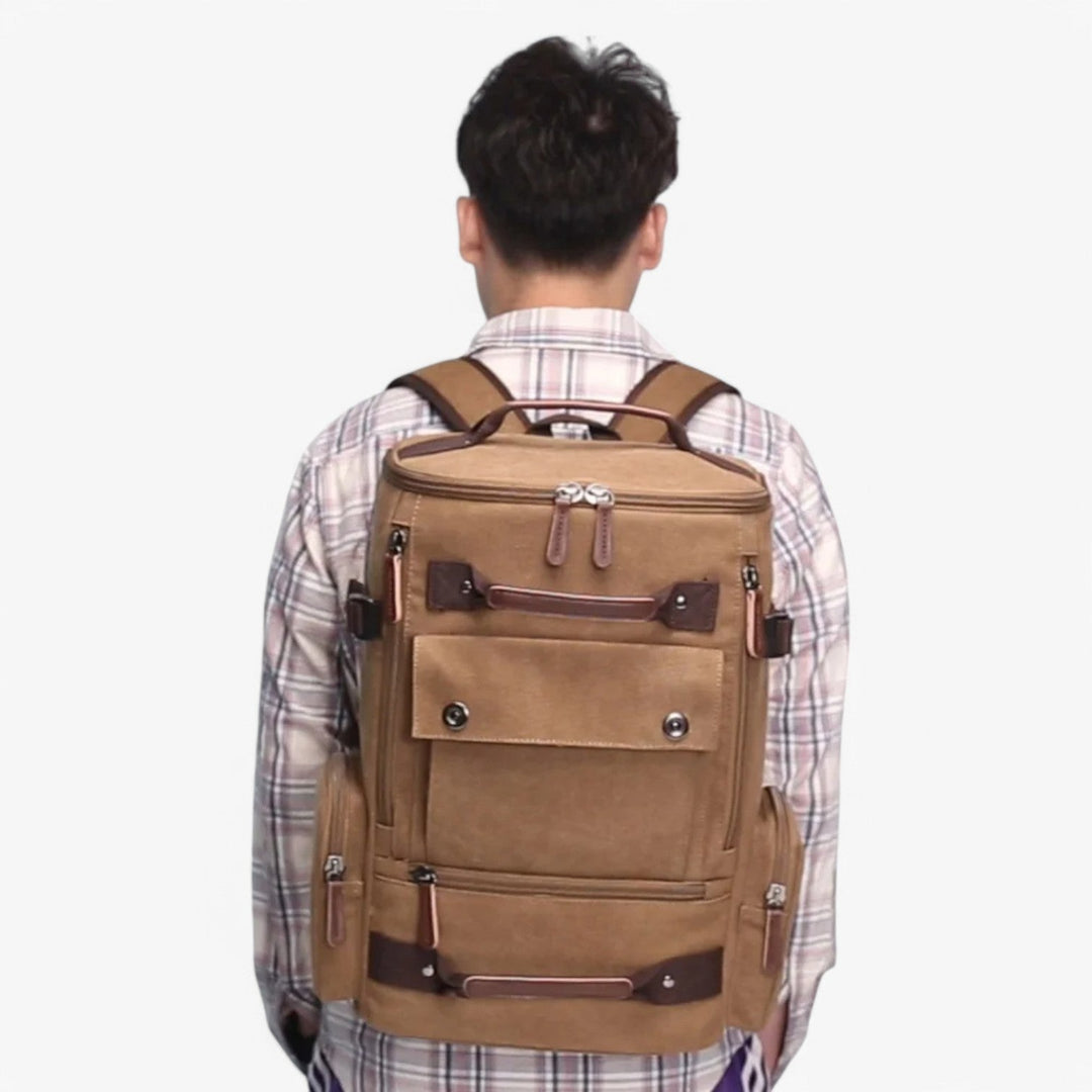 Elegante zaino blu uomo per laptop, multitasche, ideale per lavoro, scuola, viaggi brevi.