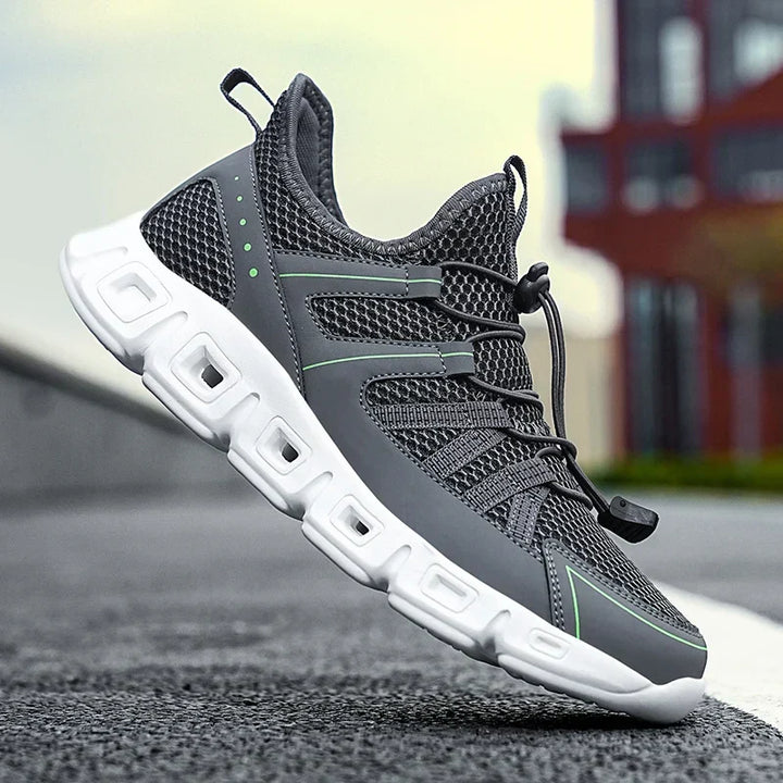 Scarpe da running uomo con trazione ottimale, perfette per allenamenti e prestazioni elevate.