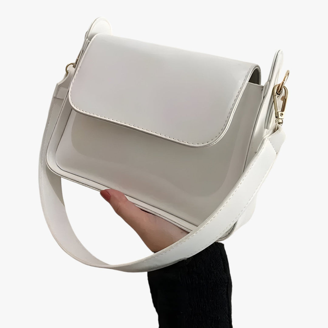 Borsa a tracolla moda donna, compatta e stilosa, accessorio indispensabile per ogni occasione.