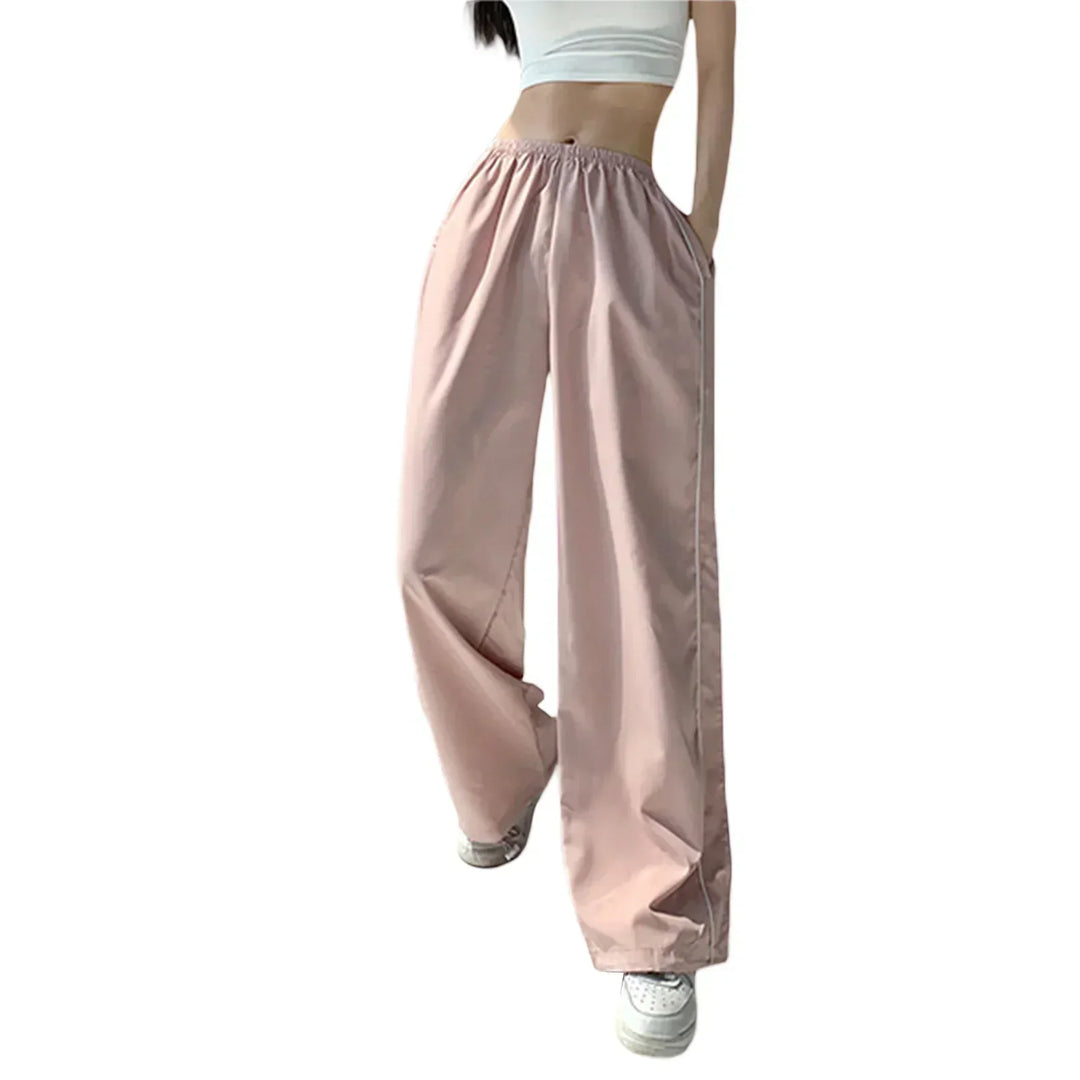 Pantaloni jogger donna alla moda, stile baggy a vita alta, perfetti per un outfit rilassato ma chic.