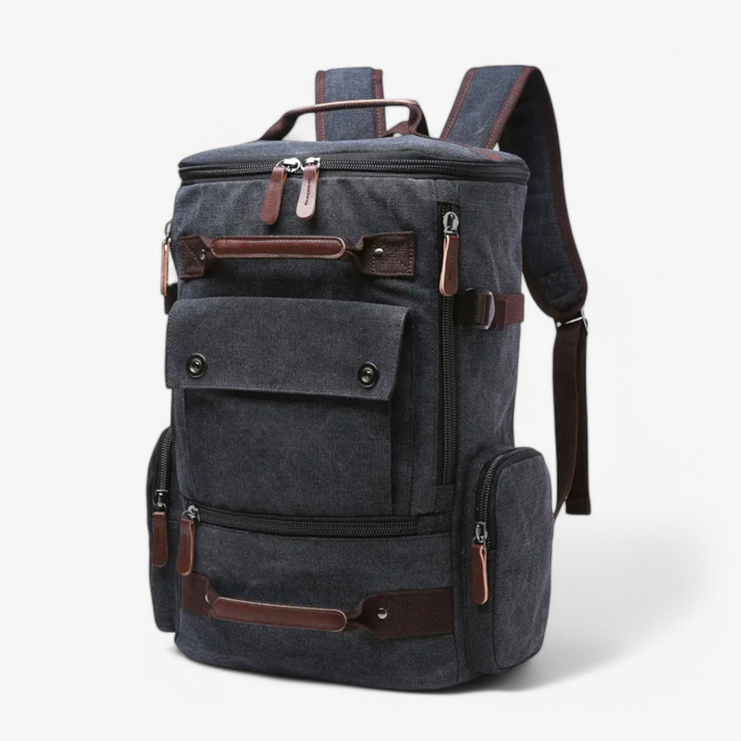 Zaino elegante blu per uomo, porta laptop e tablet, con numerose tasche interne ed esterne.