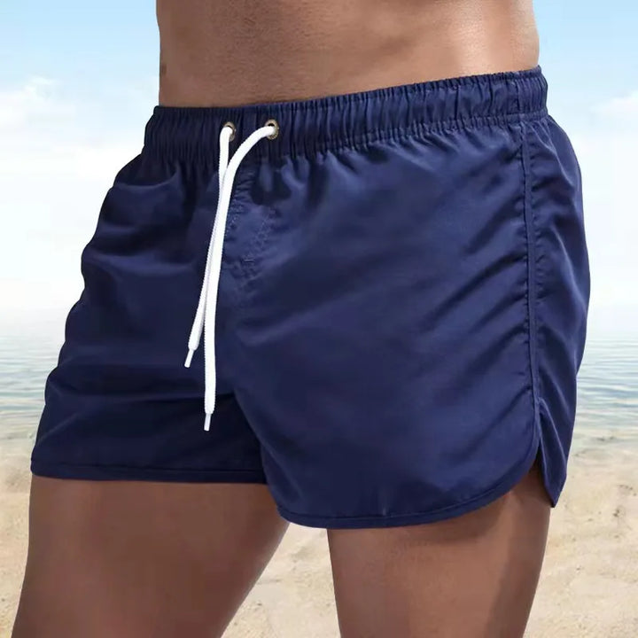 Pantaloncini mare uomo asciugatura rapida per nuoto e surf. Ideali per spiaggia e sport acquatici estivi.