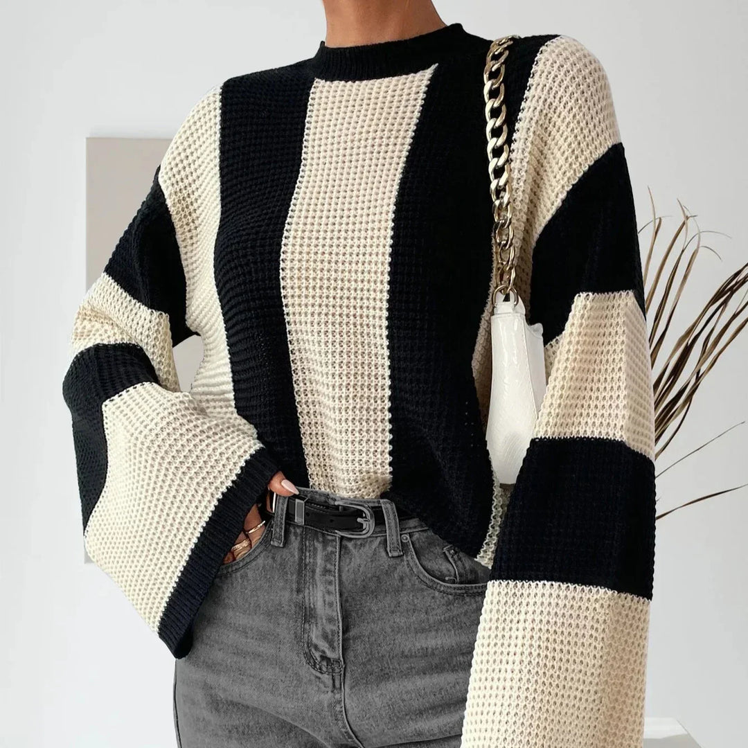 Moda autunno: maglione donna girocollo, vestibilità ampia e maniche comode per comfort quotidiano.