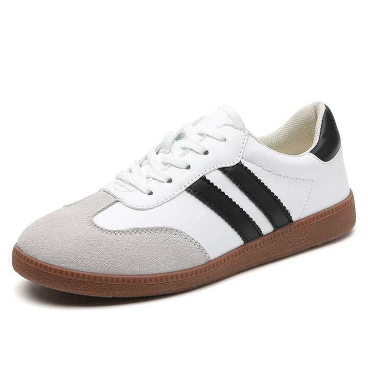 Scarpe sneakers da donna low-top, design moderno e comodo, perfette per un uso versatile e quotidiano. [[lstfy-media:7]]