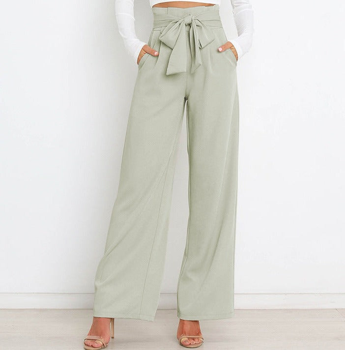 Pantaloni donna eleganti con vita alta, gamba ampia e cintura. Comodi e alla moda.