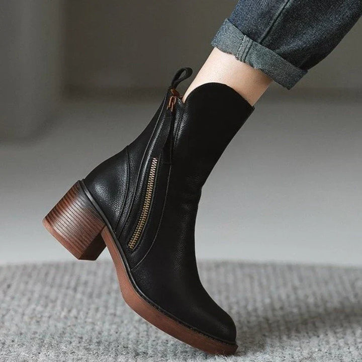 Stivaletti donna con tacco alto e suola antiscivolo, ideali per camminare con stile e sicurezza in inverno.