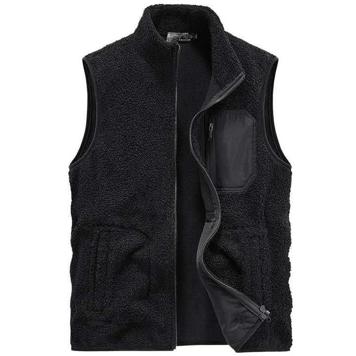 Gilet uomo senza maniche autunnale, tasca utility, design versatile per look casual ed elegante.