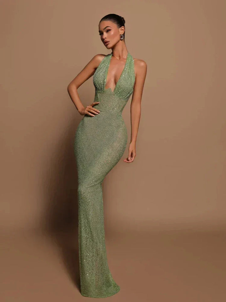 Vestito midi da donna elegante per occasioni speciali. Design senza maniche, scollo profondo e silhouette snella.