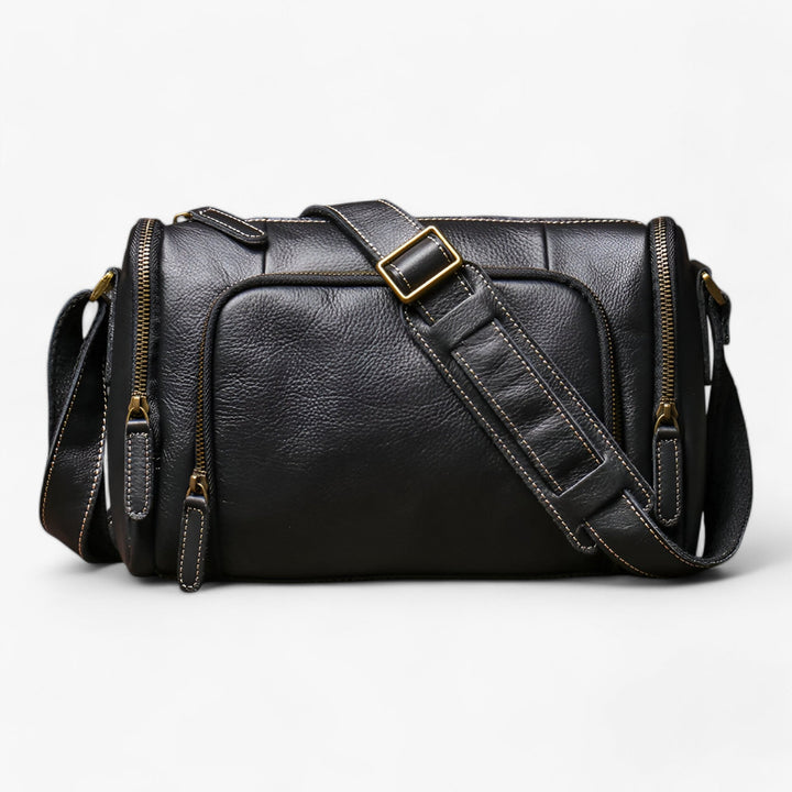Borsa messenger unisex nera, pratica e resistente in sintetico, ideale per viaggio e uso quotidiano organizzato.