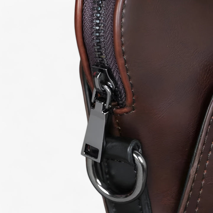 Professionista con borsa portadocumenti unisex, aggiunge un tocco di eleganza al look da ufficio.