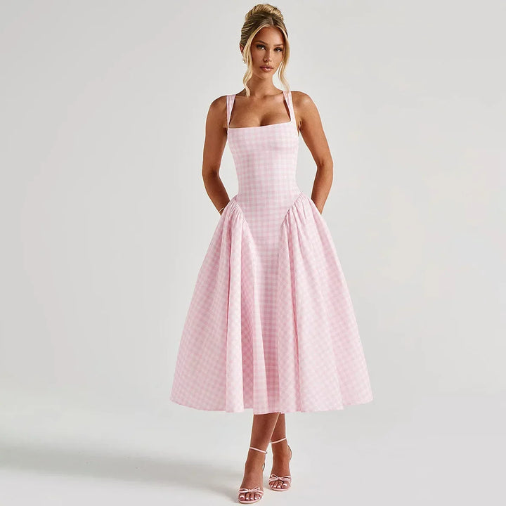 Abito lungo estivo donna a trapezio, spalline regolabili. Stile casual ed eleganza per le tue vacanze.