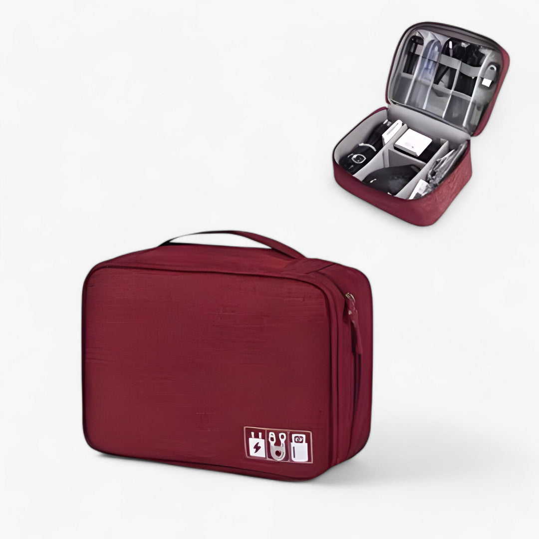 Organizer tecnologico aperto che mostra numerosi scomparti per cavi, adattatori e accessori elettronici da viaggio unisex.