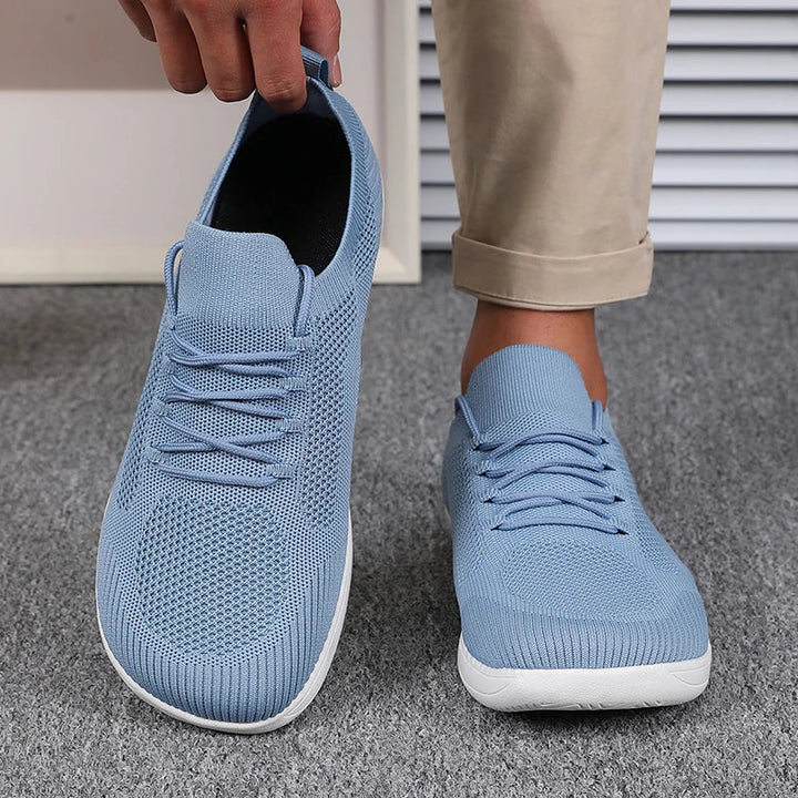 Suola ammortizzata delle sneakers uomo. Design leggero per assorbimento urti e comfort duraturo.