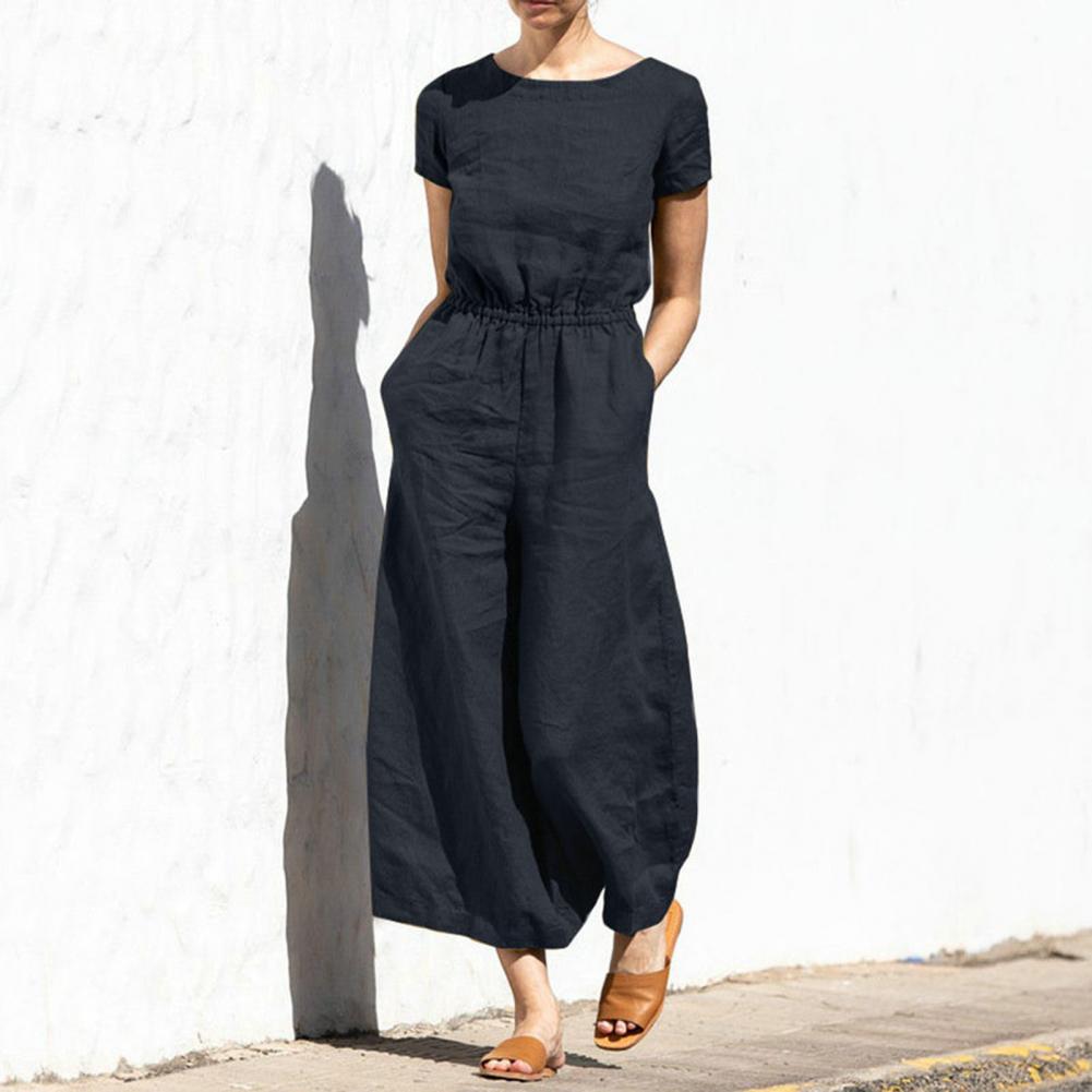 Tuta donna estiva comoda a gamba larga, tinta unita. Ideale per abbigliamento estivo versatile ed elegante.