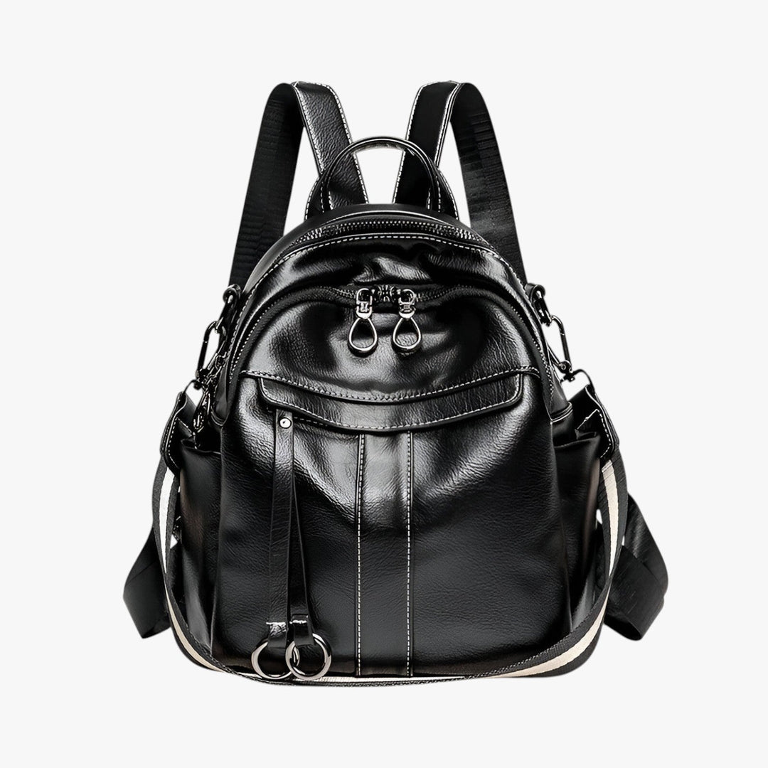 Accessorio moda: zaino compatto donna con spallacci regolabili, perfetto per uno stile casual o viaggio.