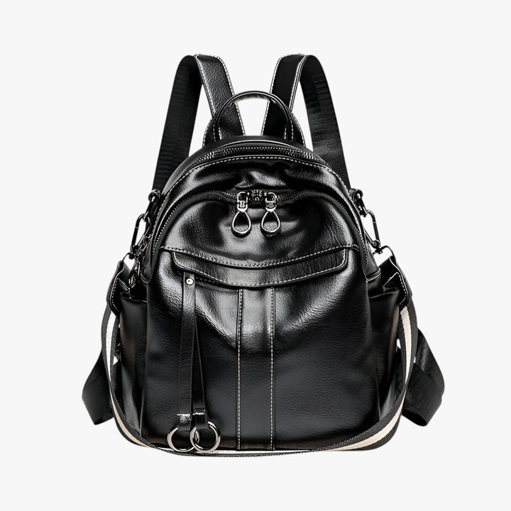 Accessorio moda: zaino compatto donna con spallacci regolabili, perfetto per uno stile casual o viaggio.
