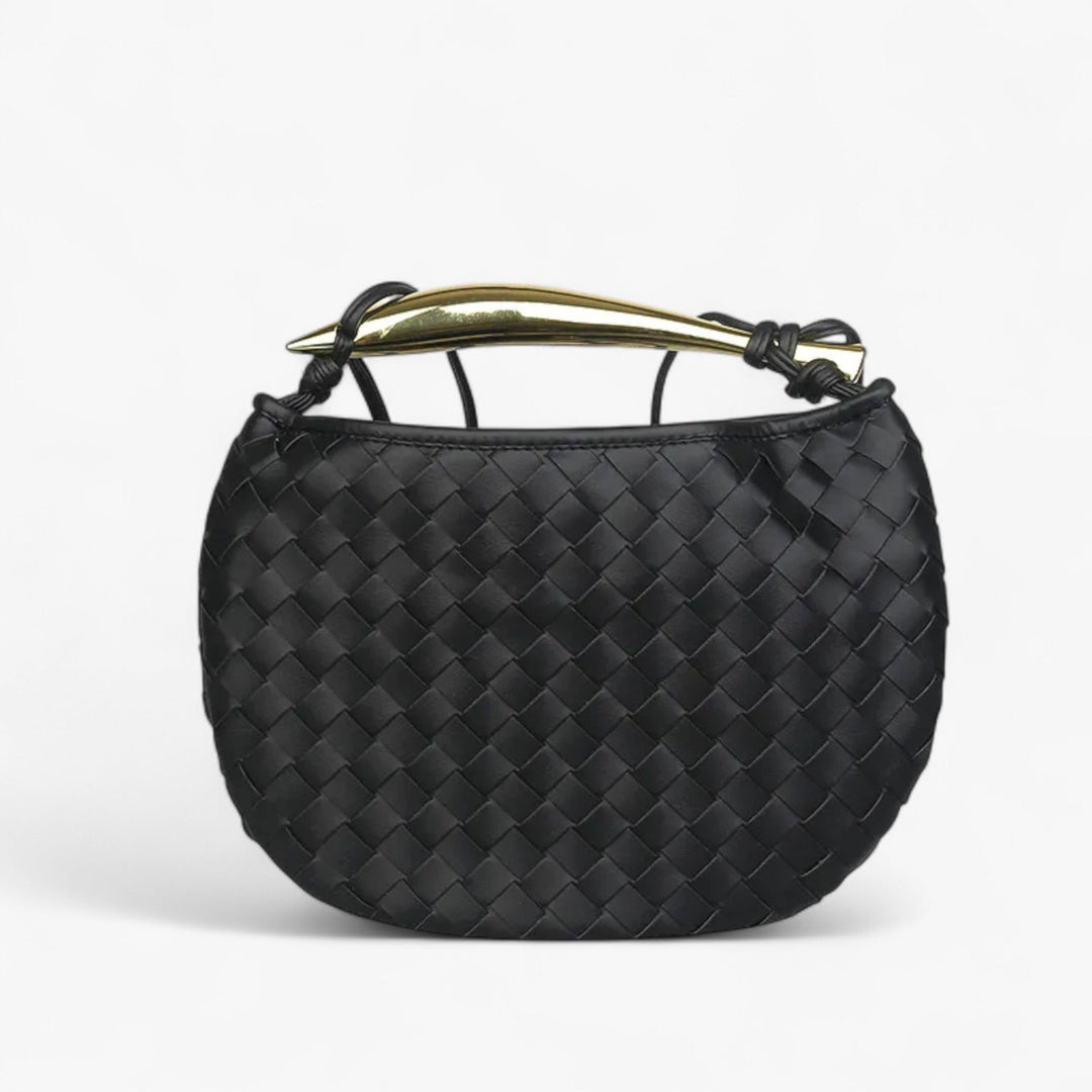 Borsa a mano donna trapuntata, elegante e compatta. Perfetta per la moda quotidiana e come accessorio versatile.