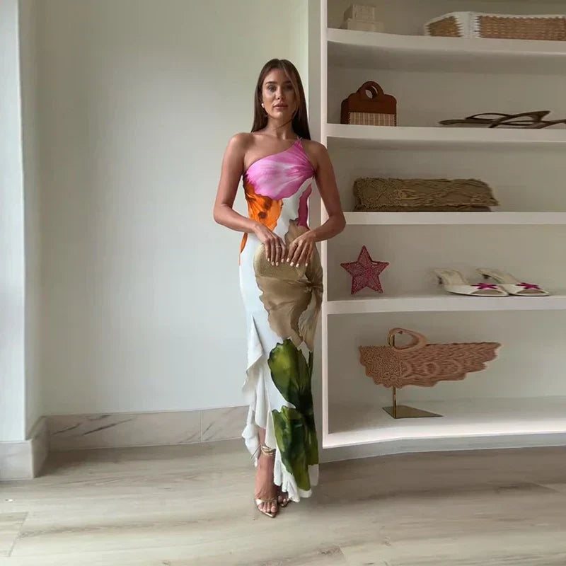 Abito maxi monospalla stampato da donna, fluido ed elegante per occasioni speciali estive.
